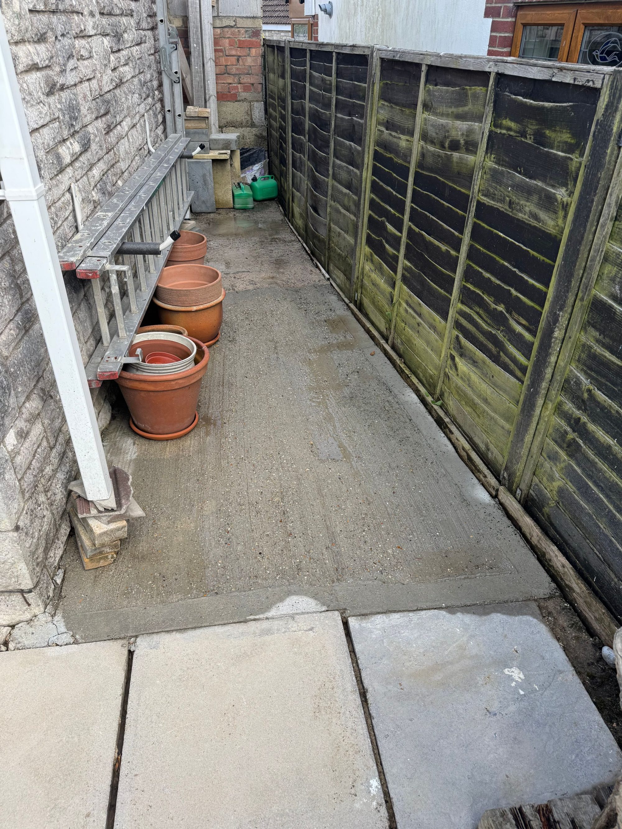 Garden alley after pressure washing in Weymouth