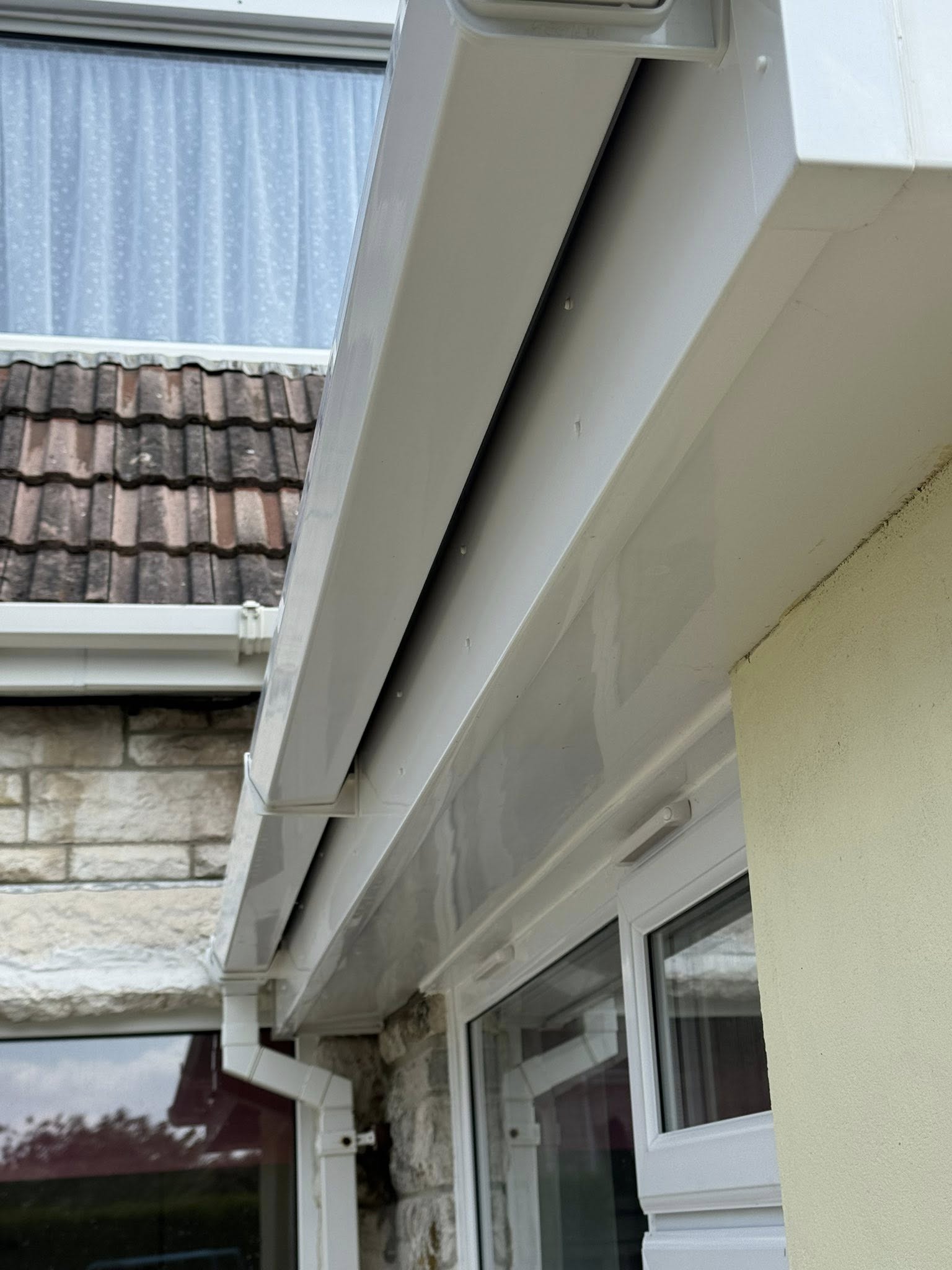 Gutter of a house extension in Weymouth after being cleaned