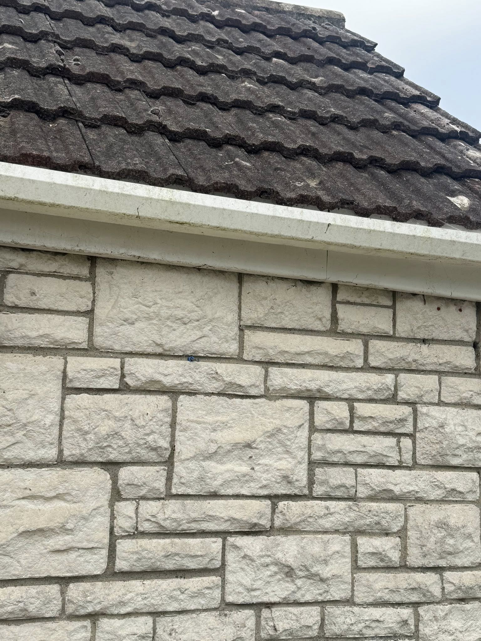 Dirty gutters of a garage in Weymouth