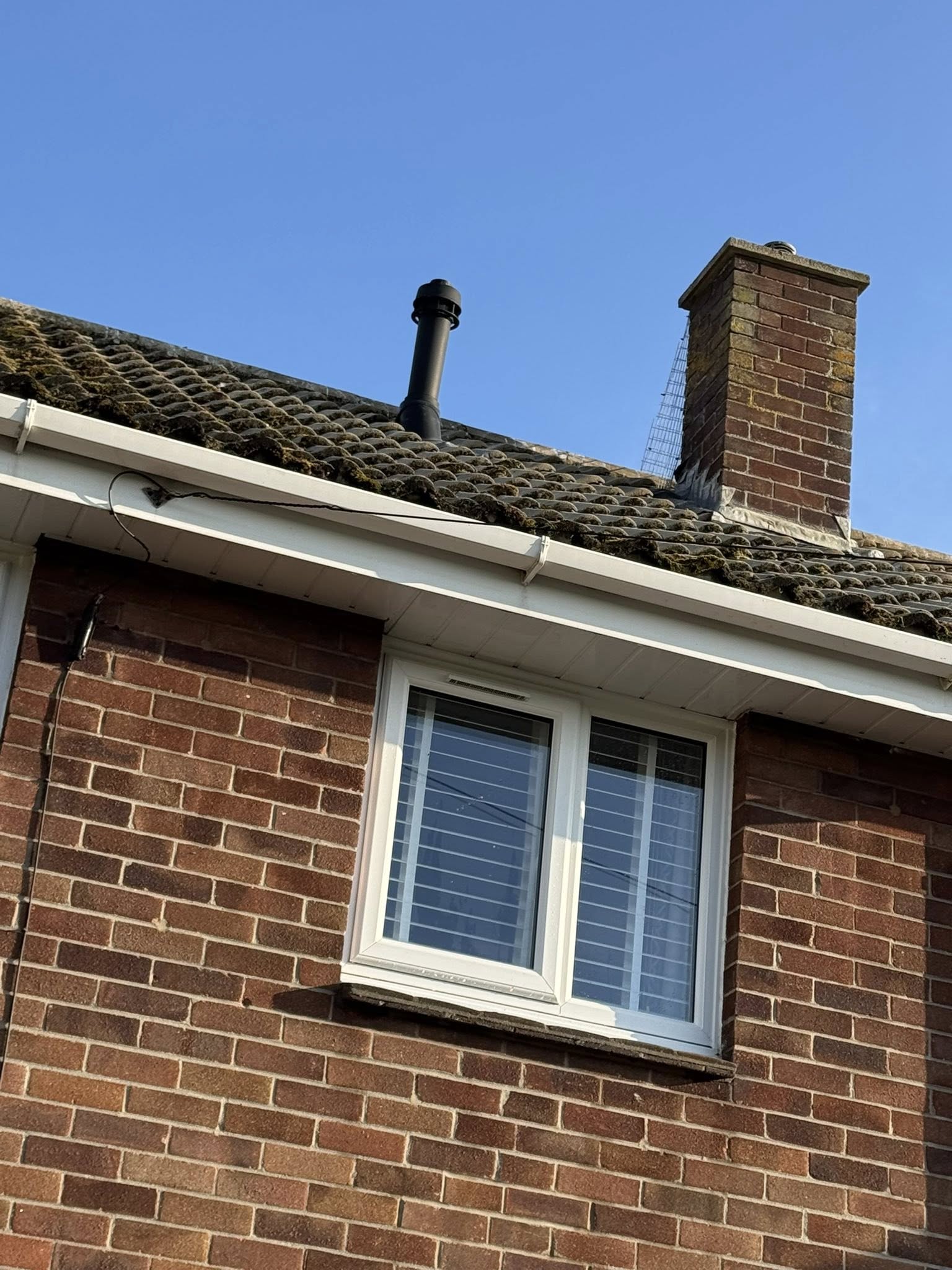 Gutters on a house in Weymouth after being pressure washed